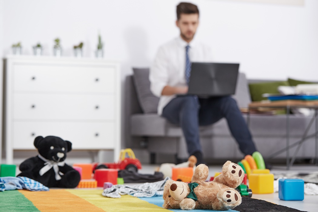 Businessman father with laptop