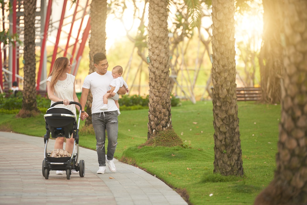  parents strolling at the park
