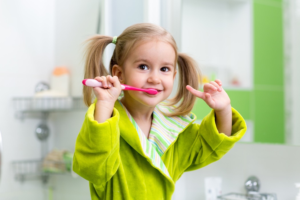 kid brushing teeth