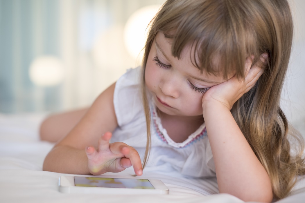 girl looking at smartphone