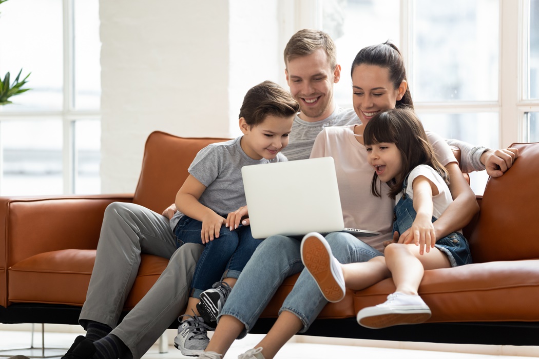 happy family on computer