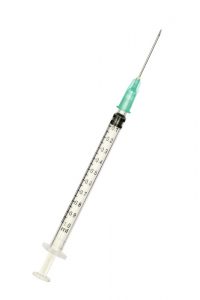 Plastic syringe isolated on white background