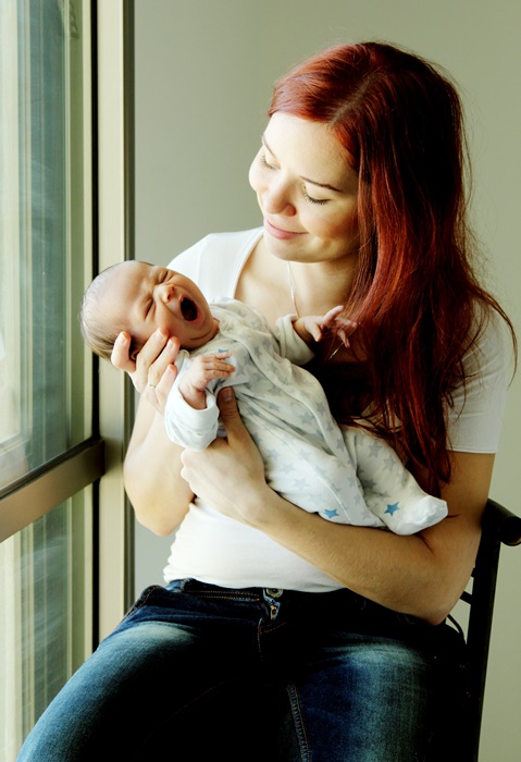 mu with her newborn baby