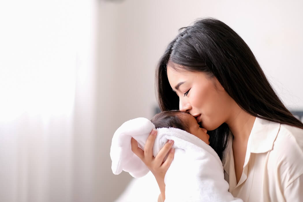 asian mum with baby