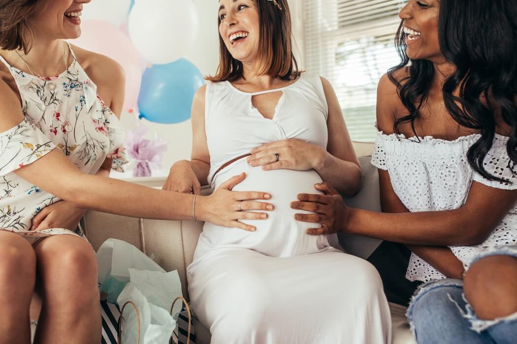 pregnancy woman with friends