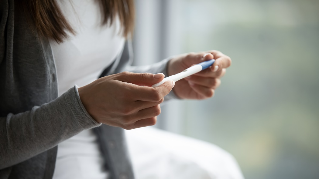 Female hold in hands pregnancy ovulation test