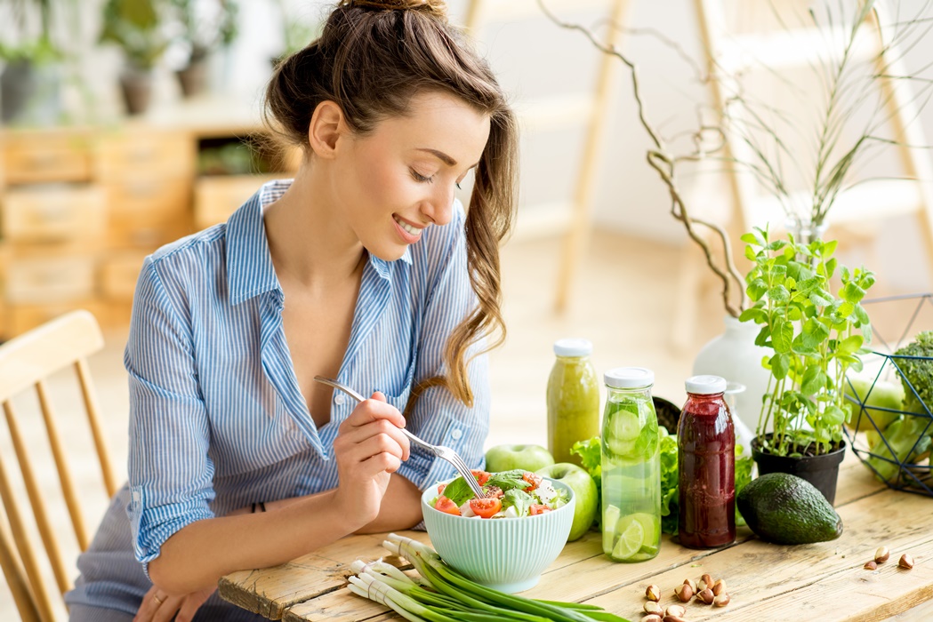 Woman eating healthy salad