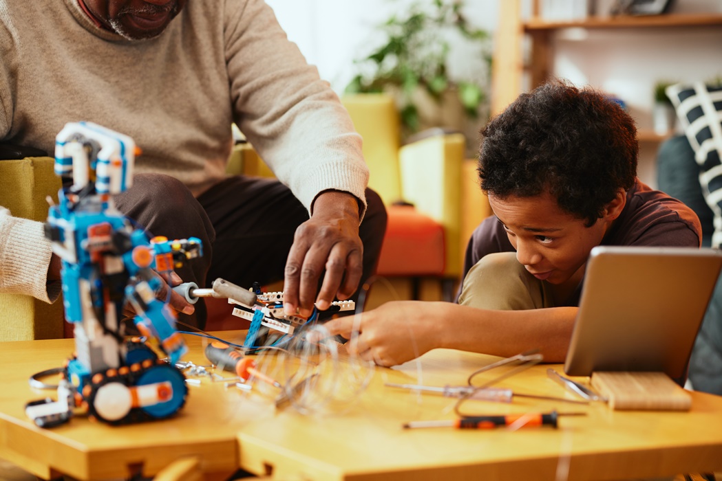 kid playing with dad