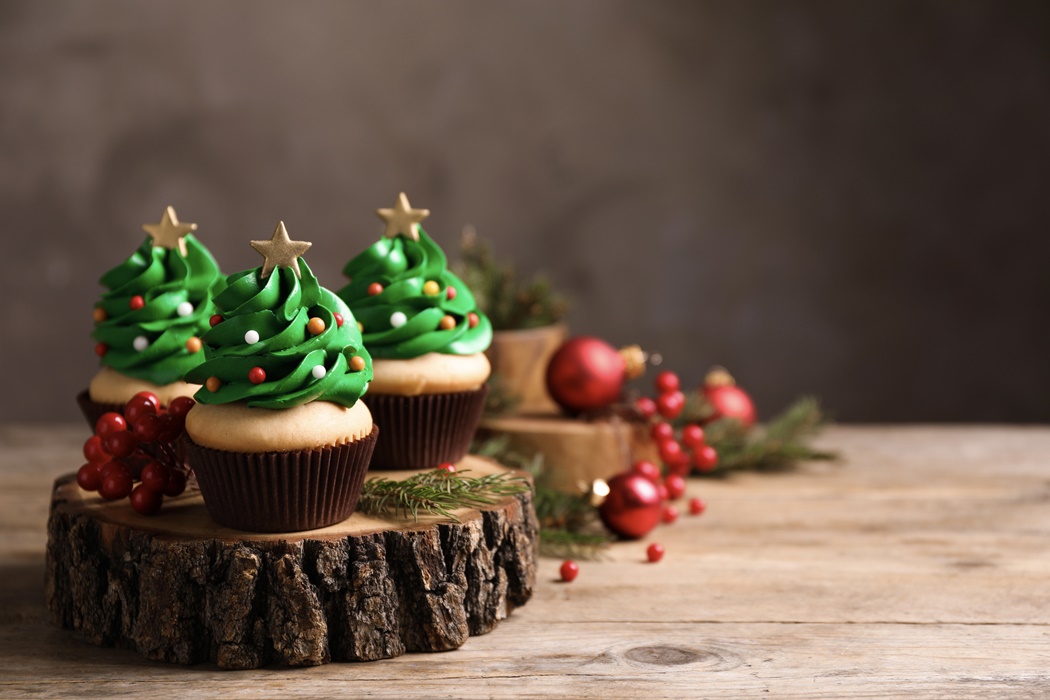 Christmas,Tree,Shaped,Cupcakes,On,Wooden,Table.,Space,For,Text
